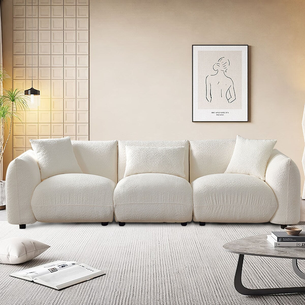 Canapé sectionnel blanc rembourré et confortable en duvet d'agneau doux avec pouf