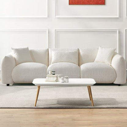 Canapé sectionnel blanc rembourré et confortable en duvet d'agneau doux avec pouf