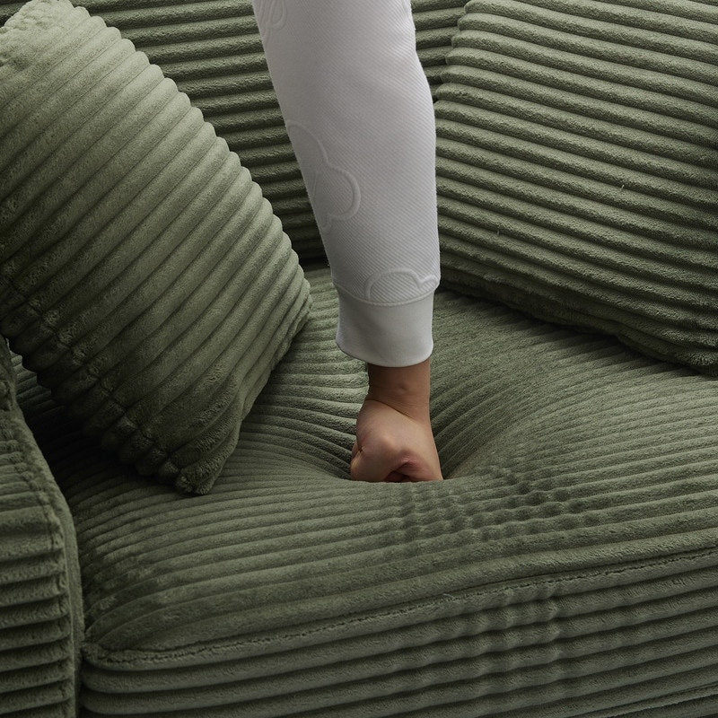 42.12 Canapé rembourré en velours côtelé + pouf