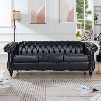 Canapé Chesterfield trois places en similicuir avec accoudoirs roulés