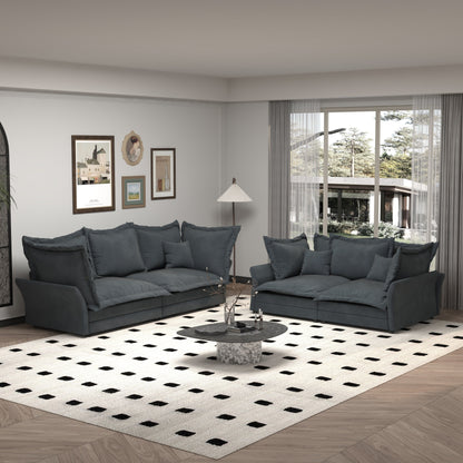 Canapés modernes à assise profonde avec plusieurs grands coussins moelleux