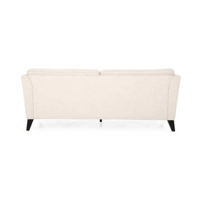 Canapé 3 places beige avec pieds en bois de bouleau et coussins latéraux