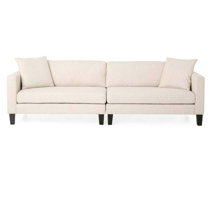 Canapé 3 places beige avec pieds en bois et deux coussins