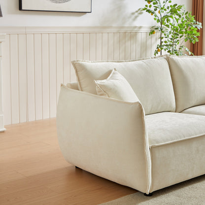 Canapé 3 places en chenille beige avec coussins supplémentaires