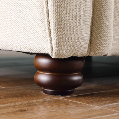 Canapé 3 places en chenille beige avec accoudoirs roulés