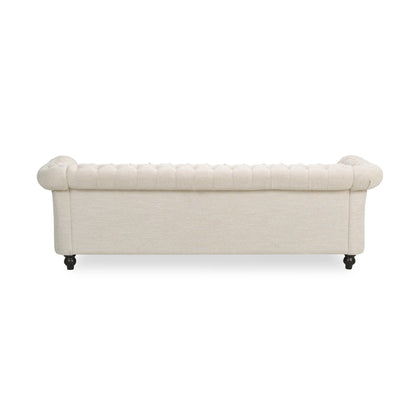 Canapé 3 places Chesterfield beige capitonné avec boutons et clous