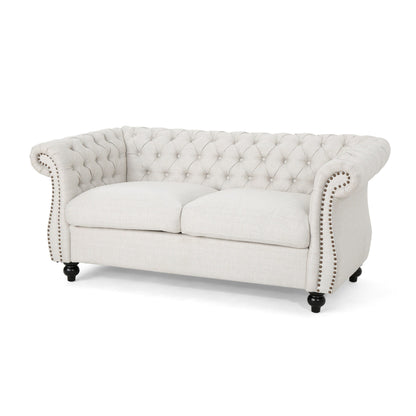Canapé Chesterfield beige capitonné à boutons avec têtes de clous