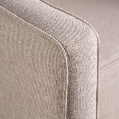 Fauteuil inclinable rembourré en tissu beige style milieu du siècle avec repose-pieds, dossier capitonné et pieds en hêtre