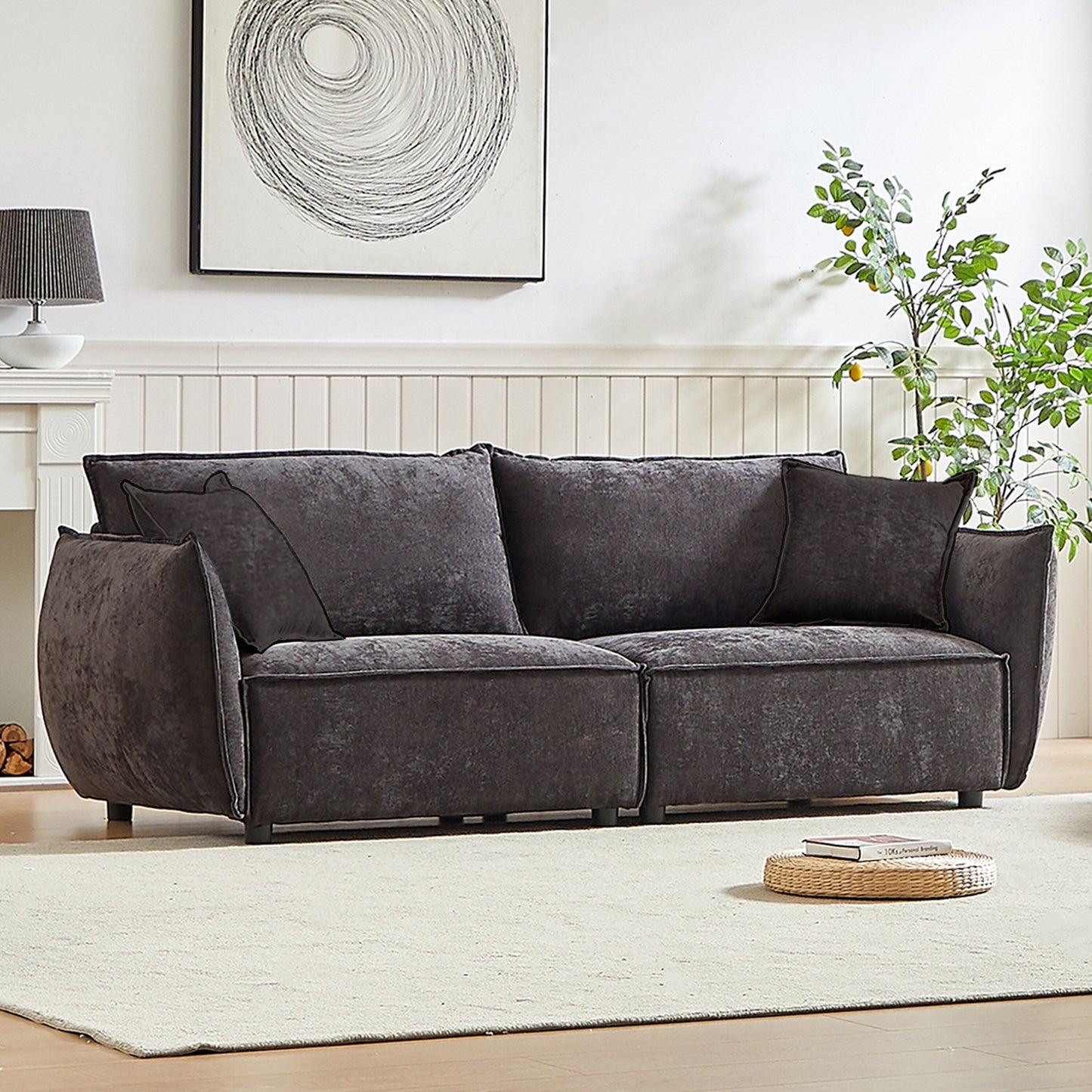 Canapé 3 places en chenille noire avec coussins supplémentaires