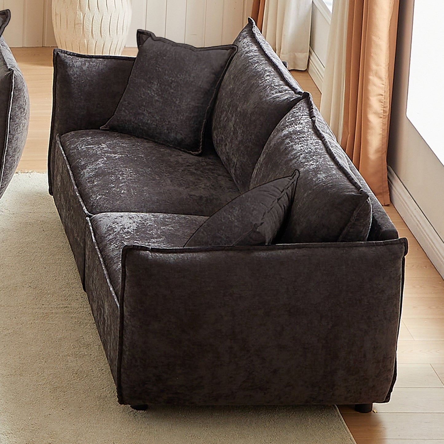 Canapé 3 places en chenille noire avec coussins supplémentaires