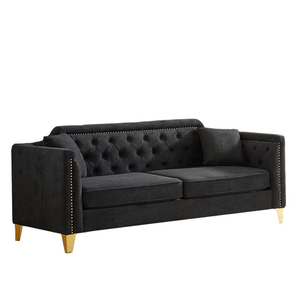 Canapé capitonné 3 places en chenille noire avec décoration cloutée en cuivre