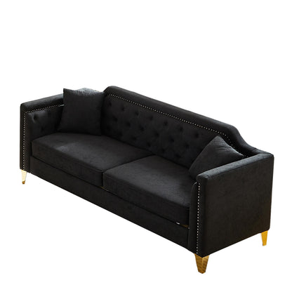 Canapé capitonné 3 places en chenille noire avec décoration cloutée en cuivre