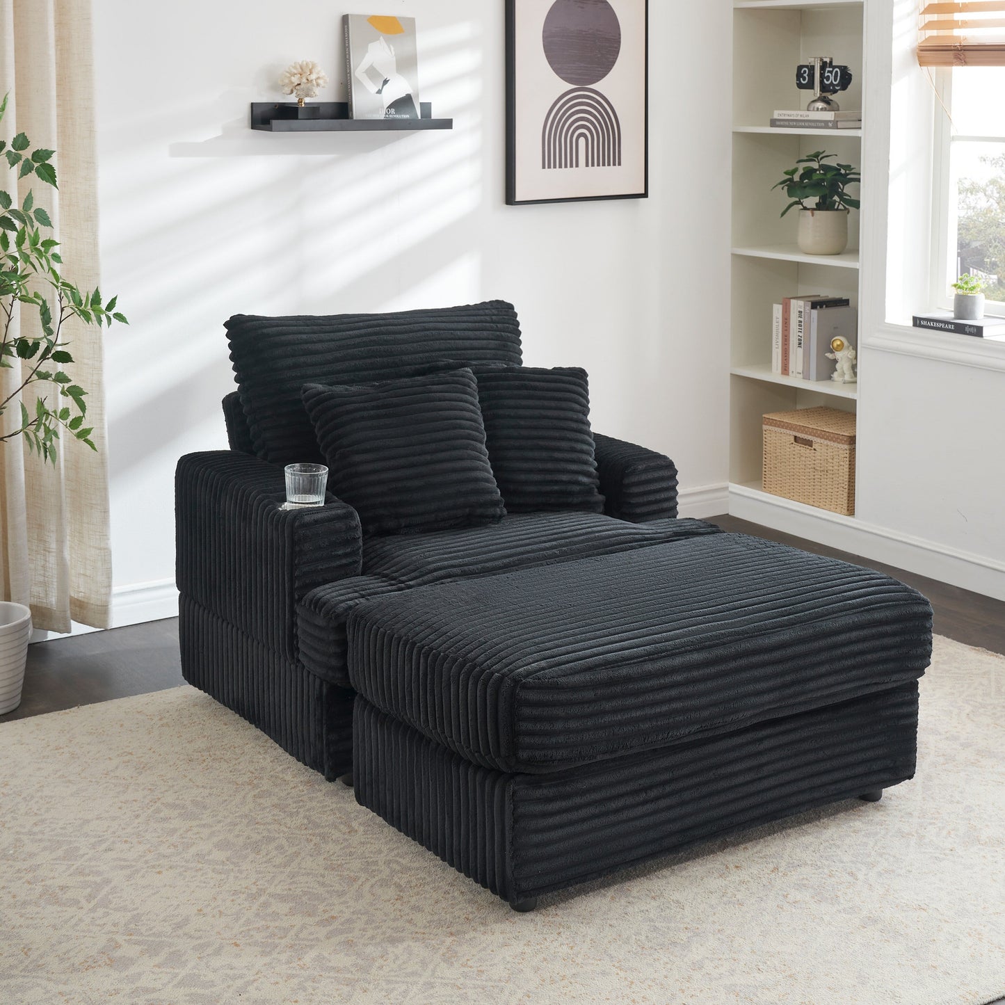 Fauteuil-canapé en velours côtelé noir avec pouf et porte-gobelet