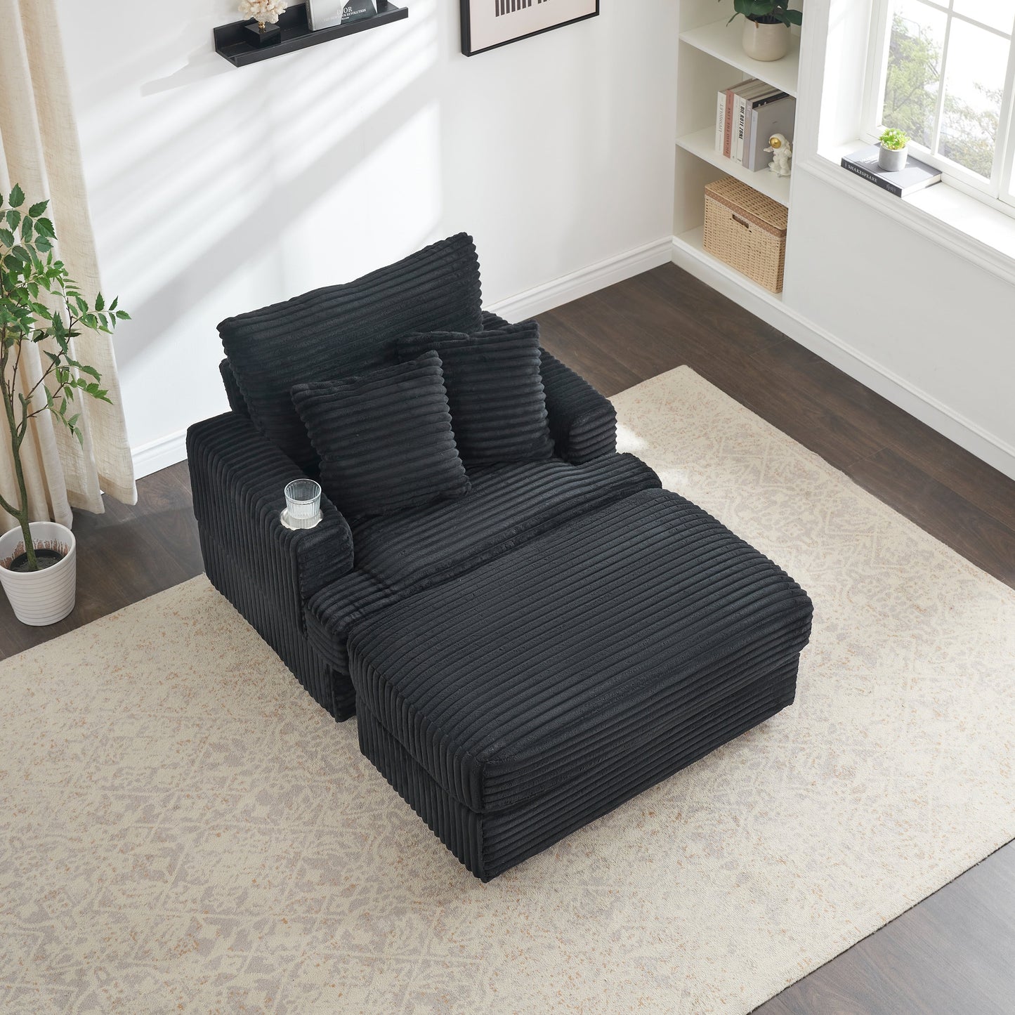 Fauteuil-canapé en velours côtelé noir avec pouf et porte-gobelet
