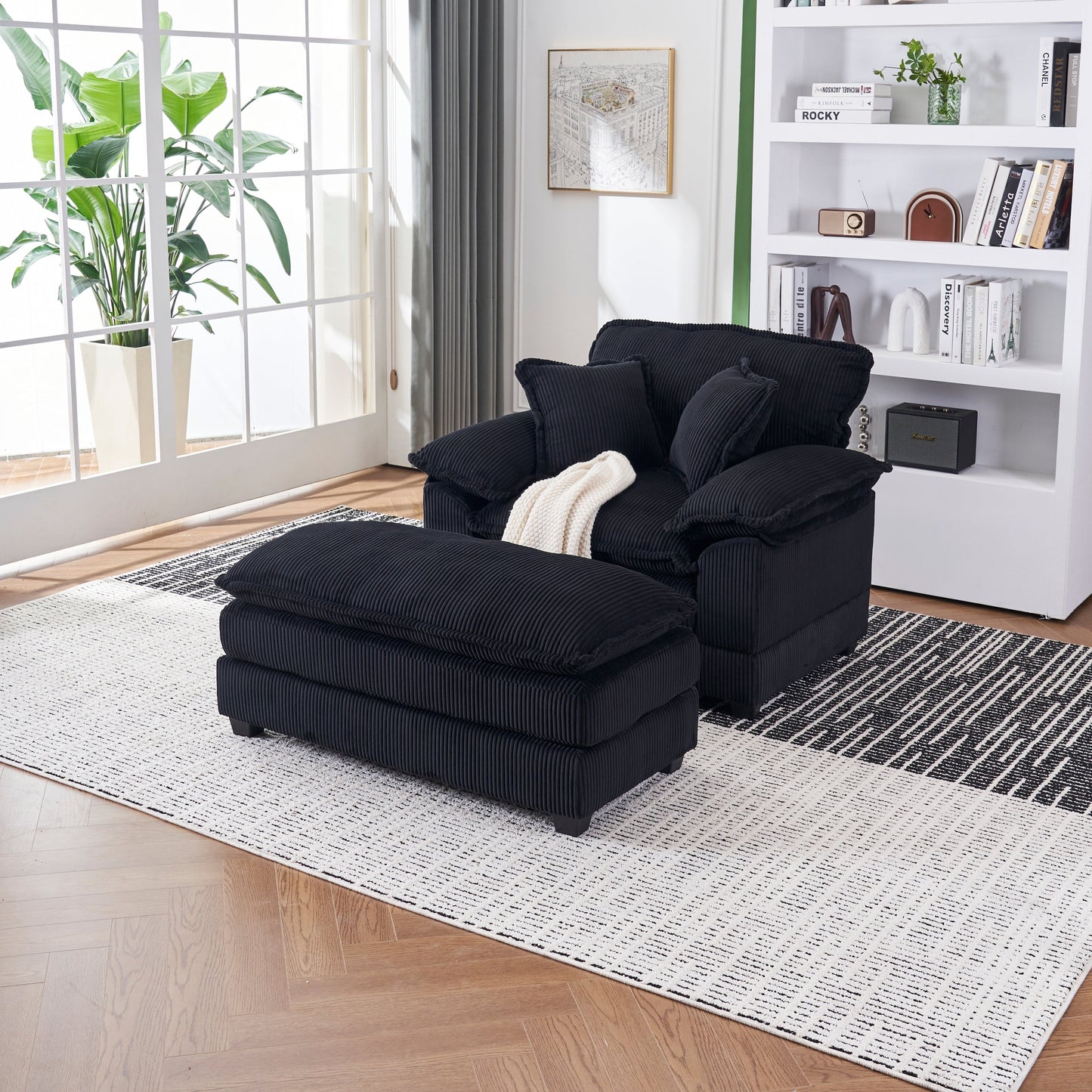 Canapé simple profond en velours côtelé noir avec pouf