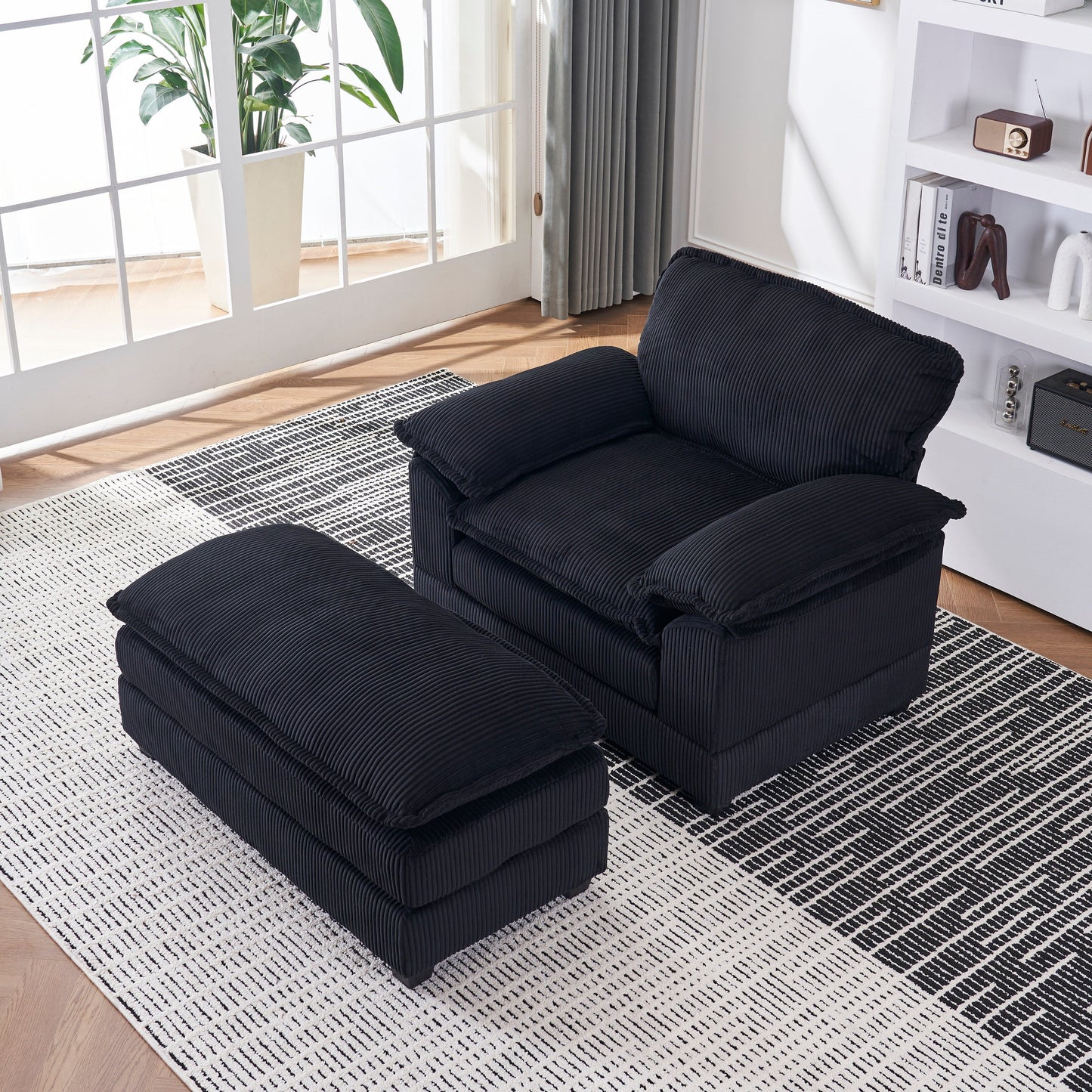 Canapé simple profond en velours côtelé noir avec pouf