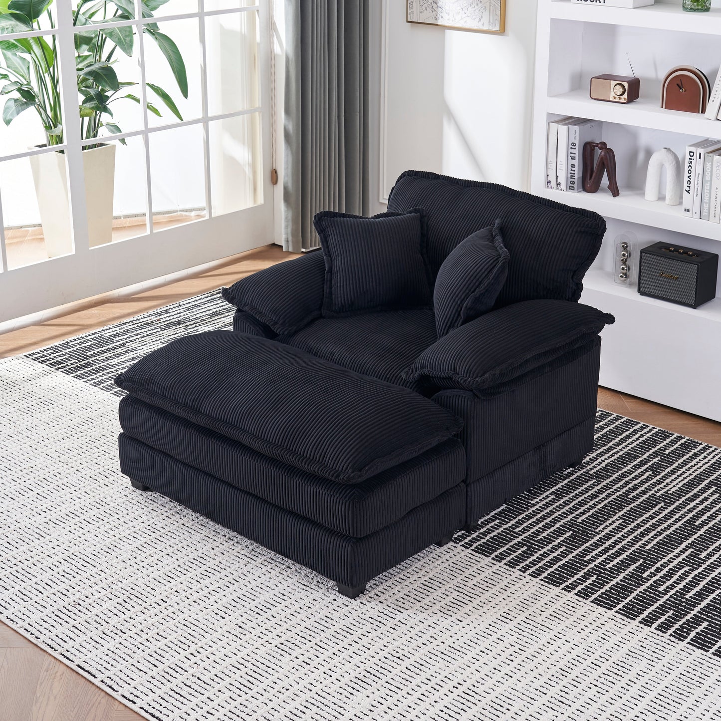 Canapé simple profond en velours côtelé noir avec pouf