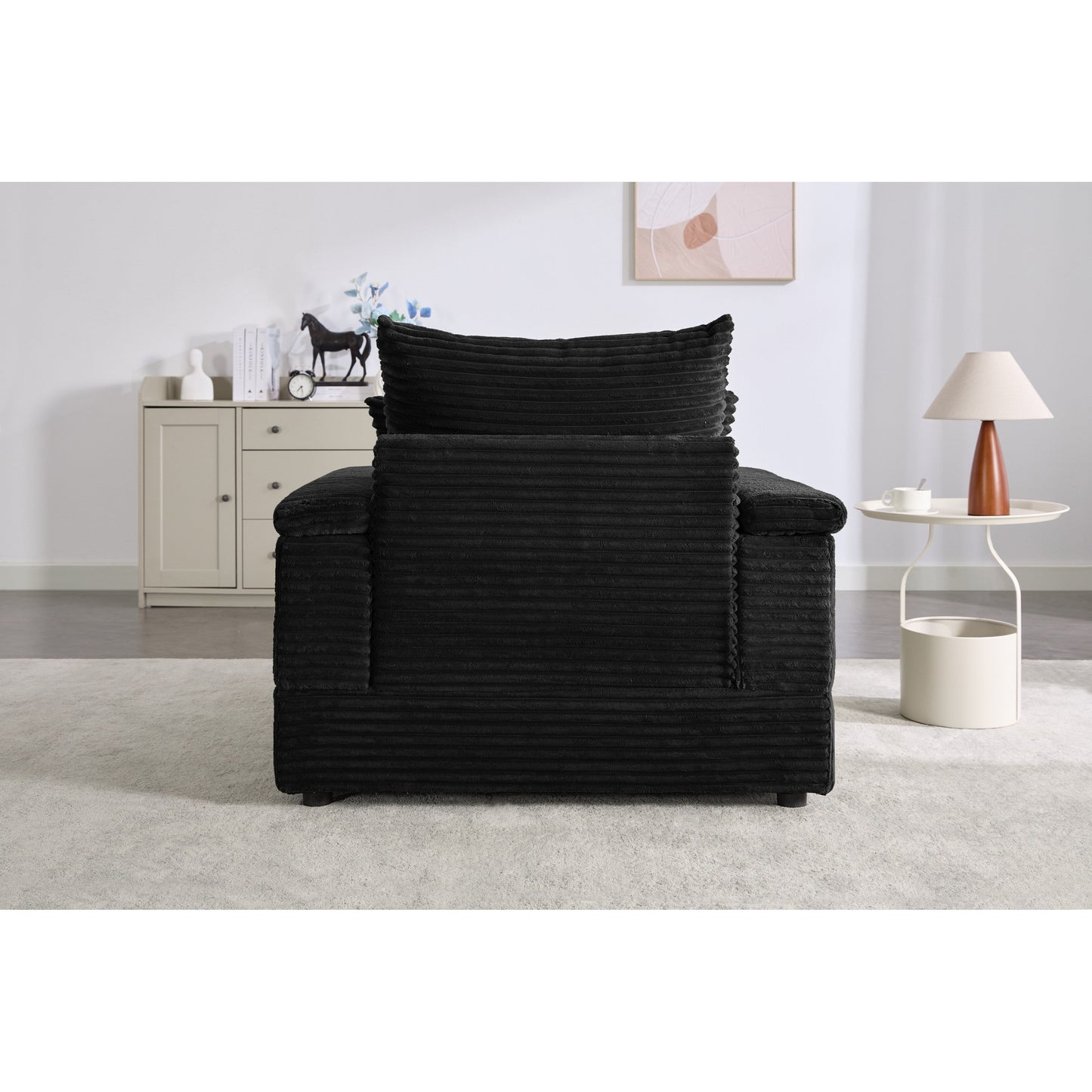 Canapé simple en velours côtelé noir avec pouf et accoudoir de rangement