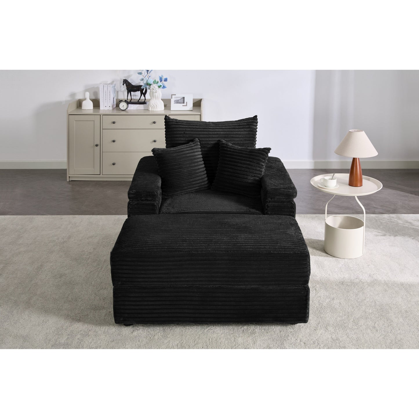 Canapé simple en velours côtelé noir avec pouf et accoudoir de rangement