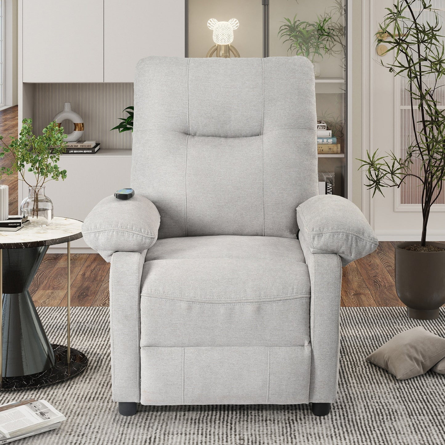 Fauteuil inclinable manuel noir avec massage et chauffage, structure robuste en bois massif et revêtement en tissu confortable