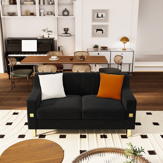 Canapé causeuse moderne en velours noir avec touches dorées et coussins moelleux pour le salon