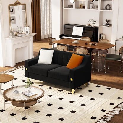 Canapé causeuse moderne en velours noir avec touches dorées et coussins moelleux pour le salon