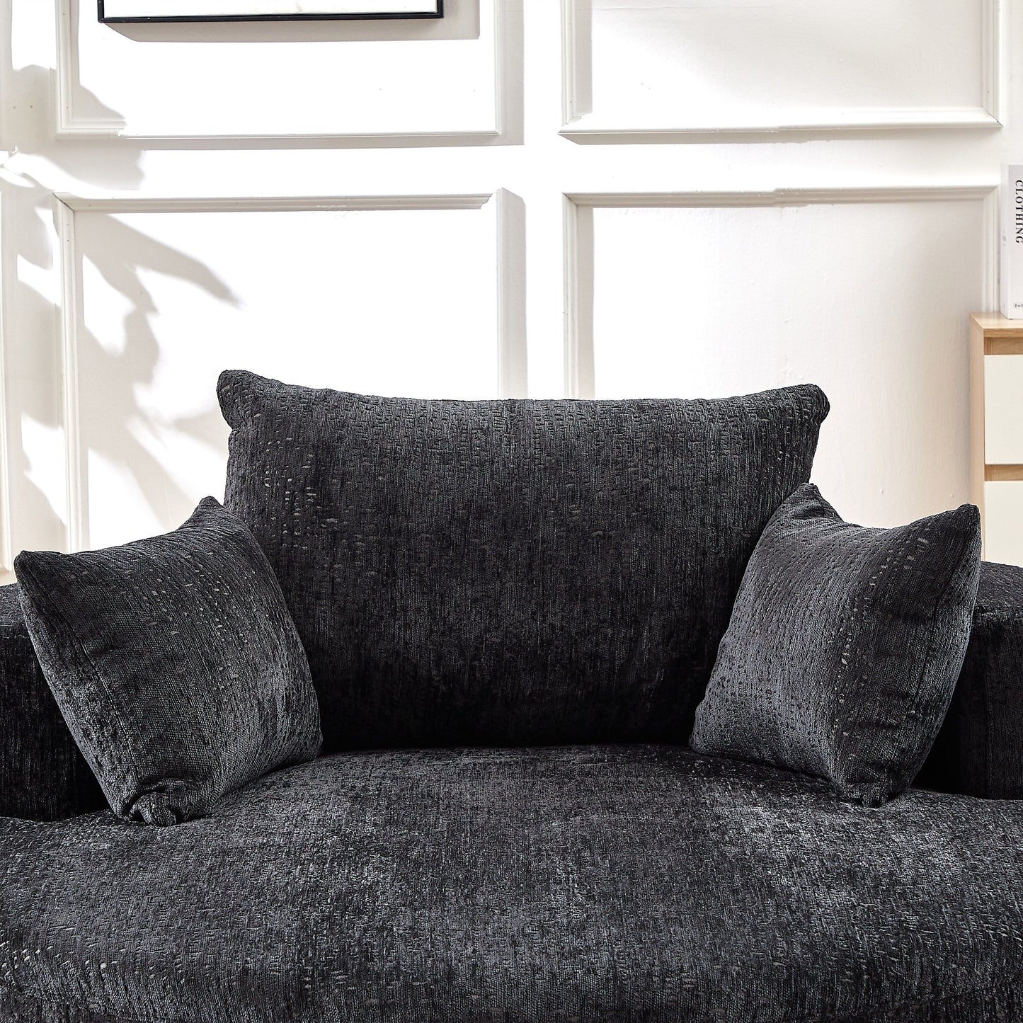 Canapé-lit simple rond en chenille noire avec coussin de dossier
