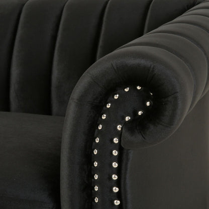 Canapé 3 places en velours noir avec accoudoirs roulés et capitonnage à boutons