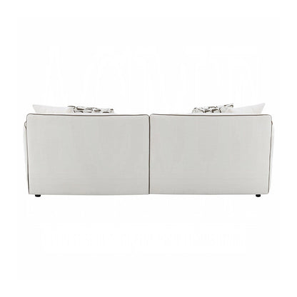 Canapé rembourré en chenille beige avec 4 coussins