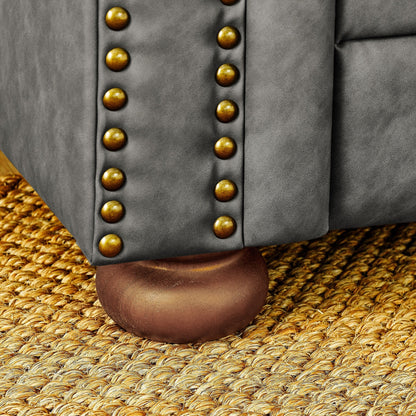 Canapé Chesterfield capitonné 3 places en PU avec accoudoirs à volutes et décoration cloutée