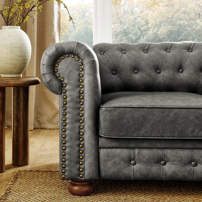 Canapé Chesterfield capitonné 3 places en PU avec accoudoirs à volutes et décoration cloutée