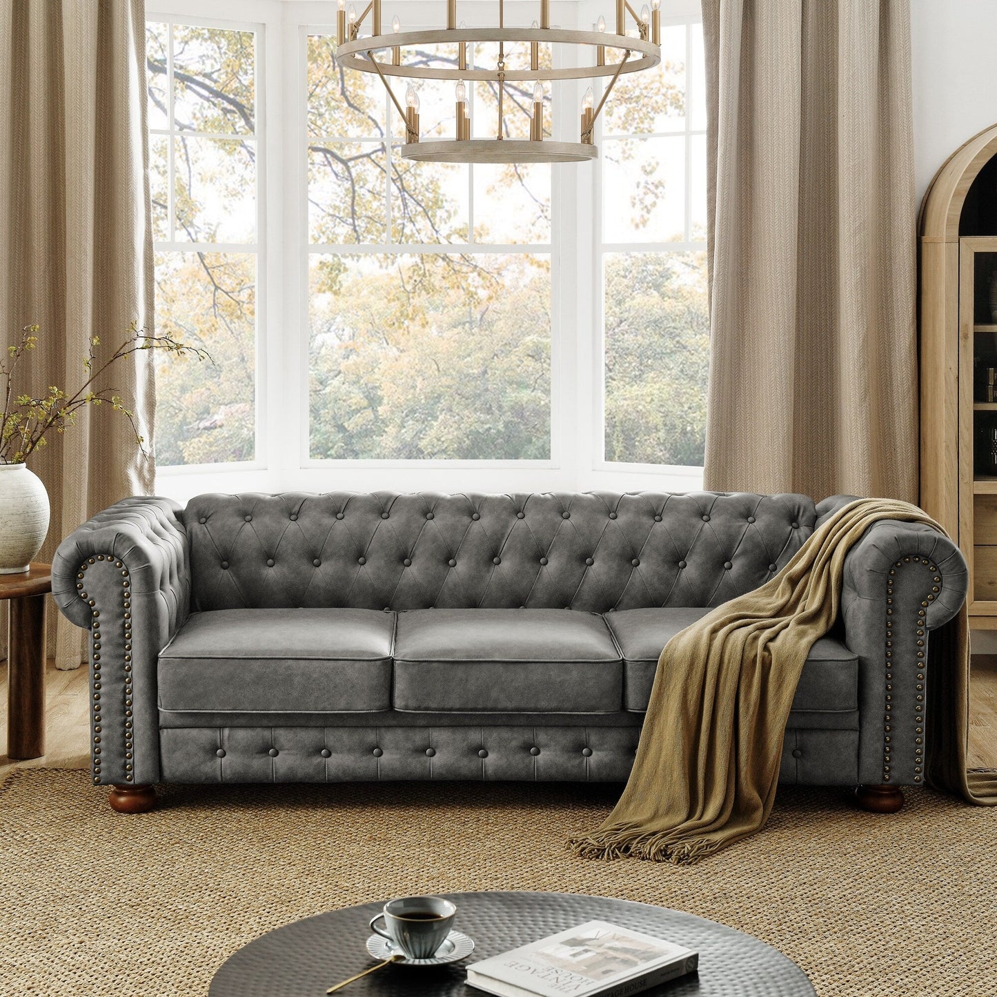 Canapé Chesterfield capitonné 3 places en PU avec accoudoirs à volutes et décoration cloutée