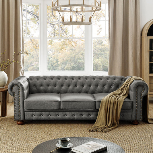 Canapé Chesterfield capitonné 3 places en PU avec accoudoirs à volutes et décoration cloutée