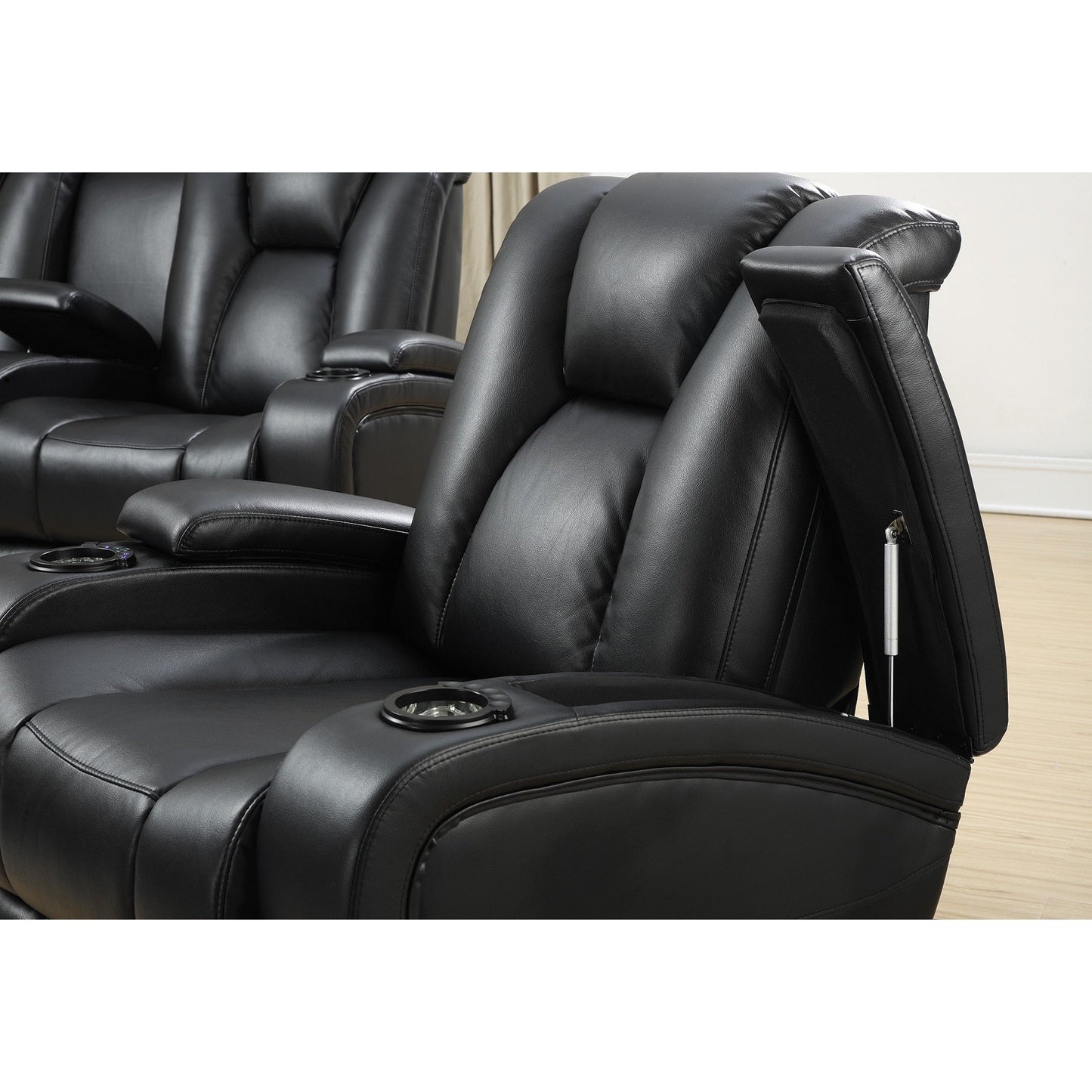 Canapé électrique Delange en similicuir noir avec appuie-têtes