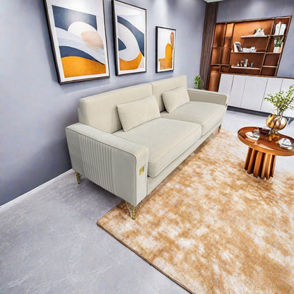 Canapé 3 places en velours blanc crème moderne 85,63 avec touches dorées et coussins moelleux pour le salon