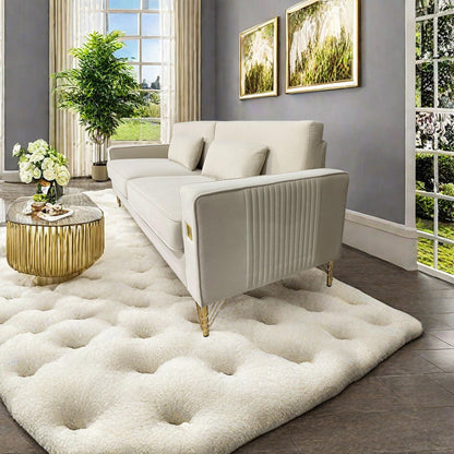 Canapé 3 places en velours blanc crème avec touches dorées