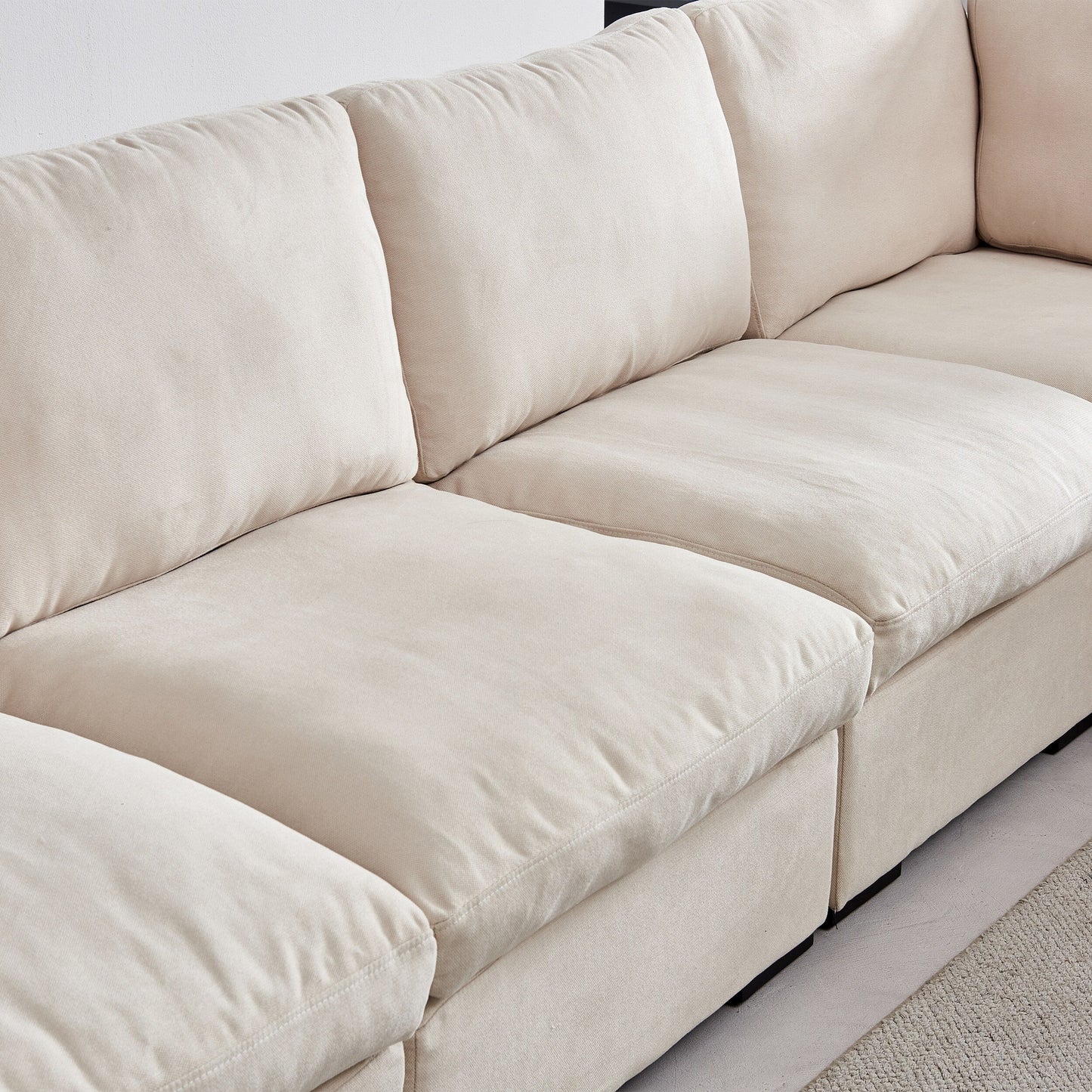 Canapé modulaire personnalisable avec pouf - Revêtement en lin doux et rembourrage en duvet pour une détente confortable