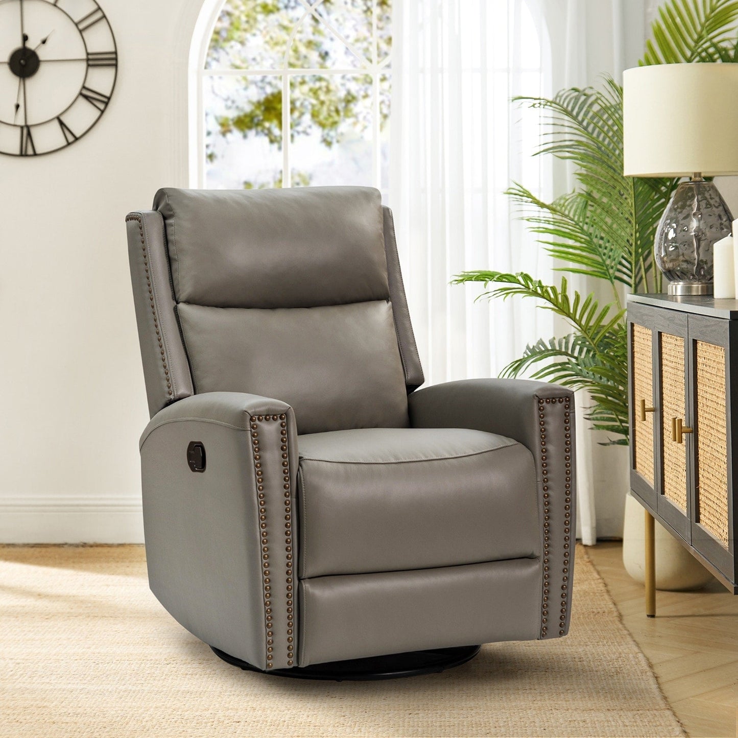 Fauteuil inclinable pivotant à oreilles Fiacro 30.31 en cuir véritable, large et moderne, avec garnitures cloutées