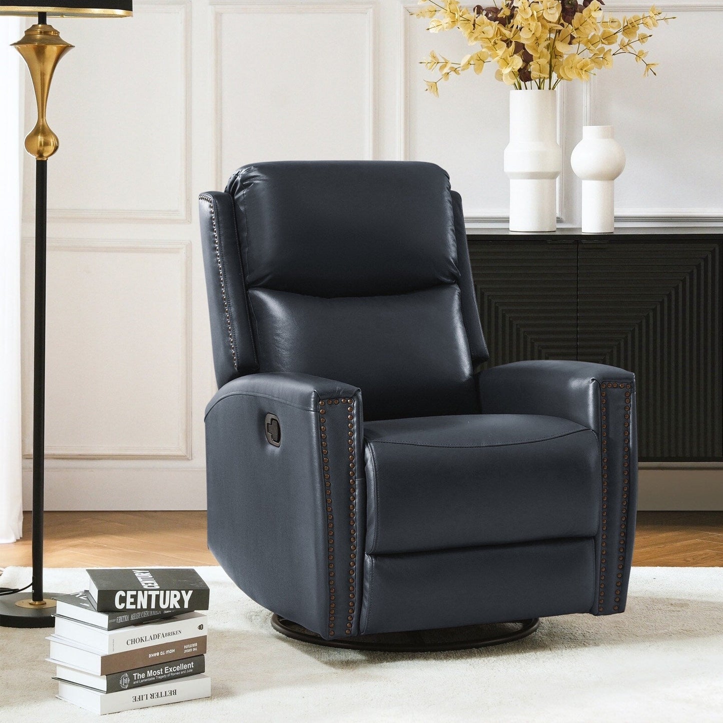 Fauteuil inclinable pivotant à oreilles Fiacro 30.31 en cuir véritable, large et moderne, avec garnitures cloutées