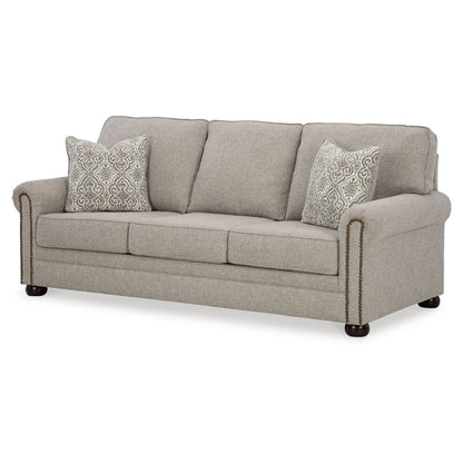 Canapé Gael, polyester gris beige, garniture cloutée marron foncé, 220 cm