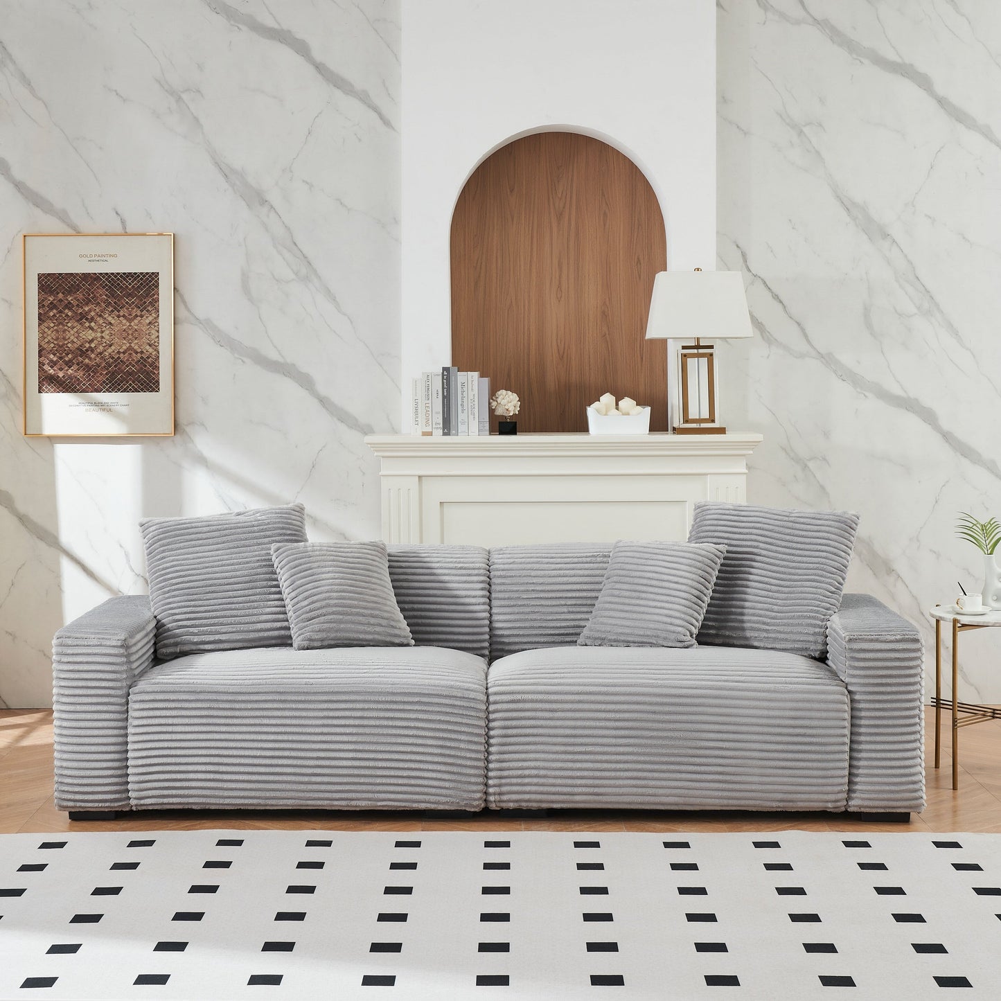 Canapé 4 places en velours côtelé gris avec coussins décoratifs