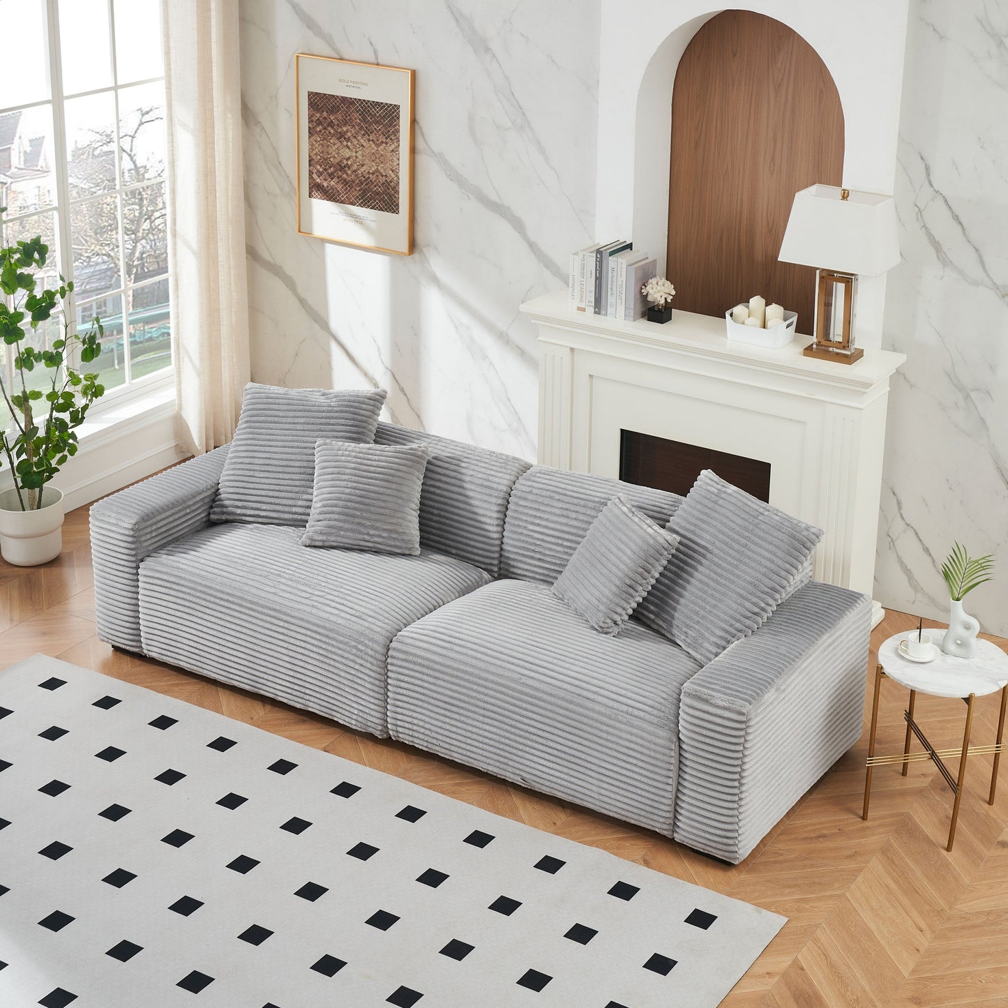 Canapé 4 places en velours côtelé gris avec coussins décoratifs