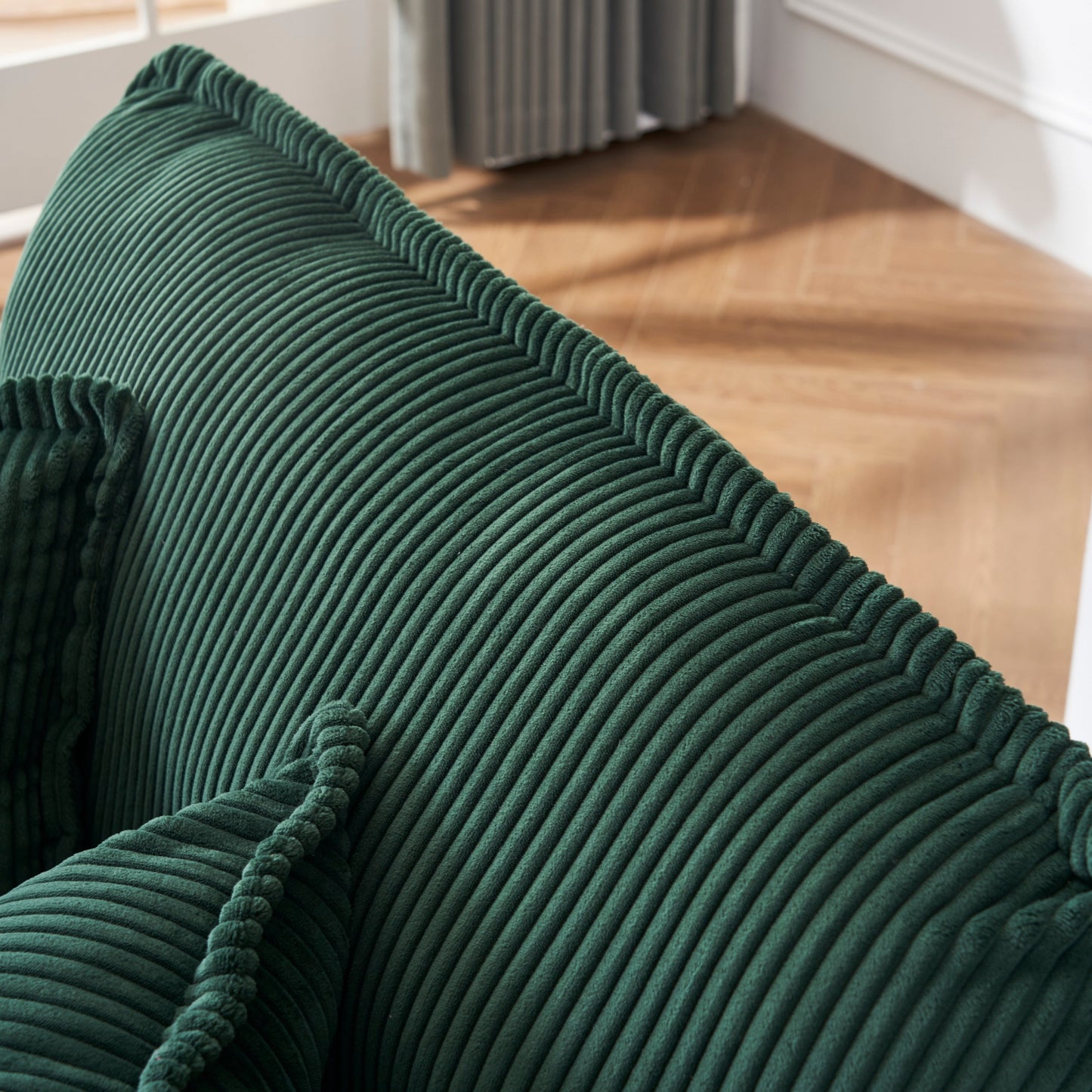 Canapé simple profond en velours côtelé vert avec pouf