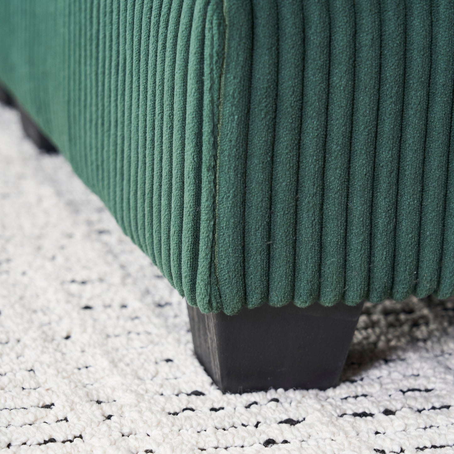 Canapé simple profond en velours côtelé vert avec pouf