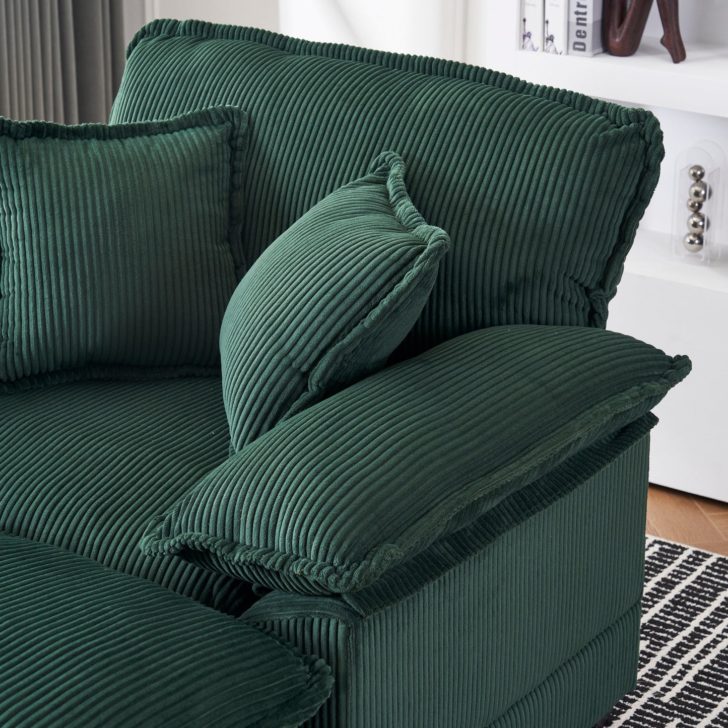 Canapé simple profond en velours côtelé vert avec pouf