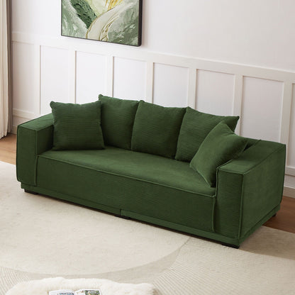 Canapé 3 places rembourré en velours côtelé vert avec coussins décoratifs