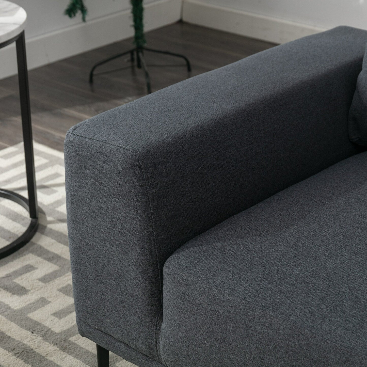 Canapé 2 places en tissu gris moderne de 190 cm avec pieds en fer et coussins confortables, pour salon, appartement ou chambre.