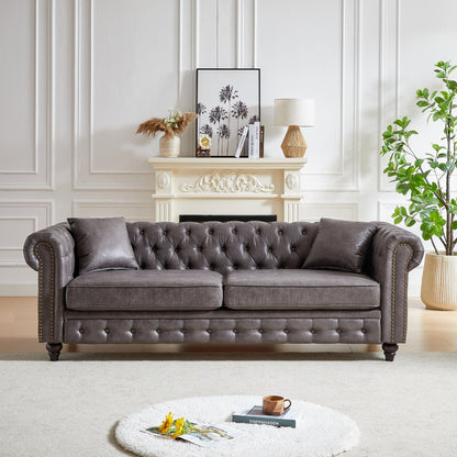 Canapé Chesterfield 3 places en tissu technique gris 85,5 avec accoudoirs roulés et 2 coussins pour le salon