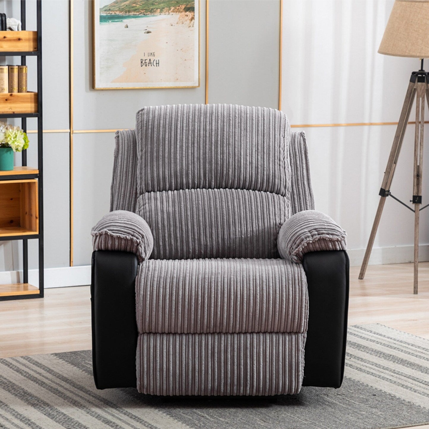 Fauteuil inclinable gris avec télécommande électrique, dossier réglable et repose-pieds pour un confort ultime dans votre salon