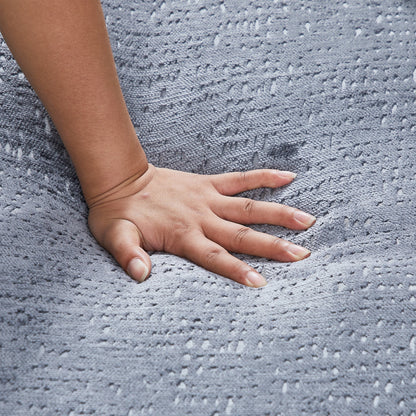 Canapé-lit simple rond en chenille grise avec coussin de dossier